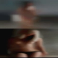 Nude women having wellingtons